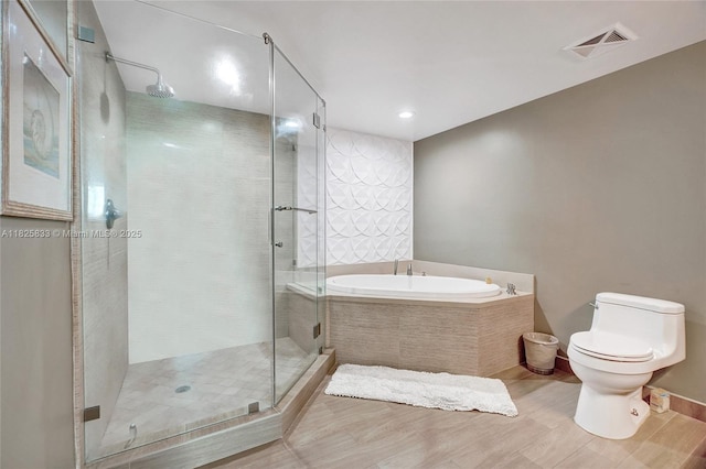 7930 E Dr Unit 1806, North Bay Village, FL 33141 - bathroom featuring a bath, a shower stall, and wood finished floors