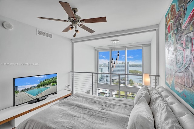 7930 E Dr Unit 1806, North Bay Village, FL 33141 - bedroom with a ceiling fan