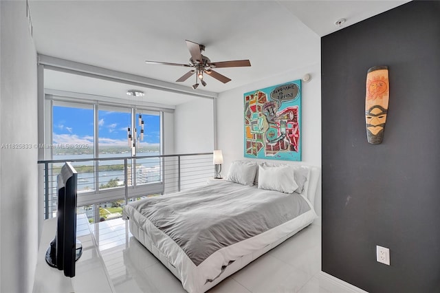 7930 E Dr Unit 1806, North Bay Village, FL 33141 - tiled bedroom featuring a ceiling fan