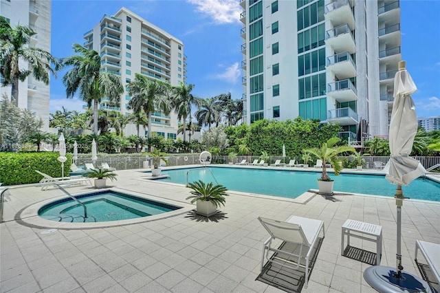 7930 E Dr Unit 1806, North Bay Village, FL 33141 - community pool with a patio and a community hot tub