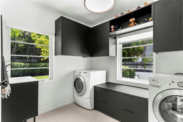 600 NE 55th Ter, Miami, FL 33137 - washroom with cabinet space and light tile patterned floors