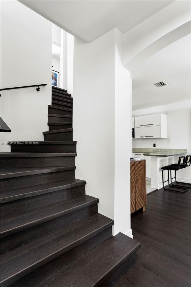 600 NE 55th Ter, Miami, FL 33137 - stairs with wood finished floors