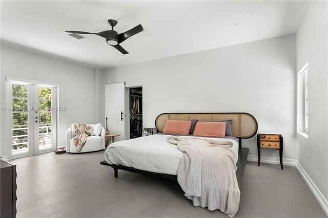 600 NE 55th Ter, Miami, FL 33137 - bedroom featuring access to outside, a ceiling fan, french doors, and finished concrete floors