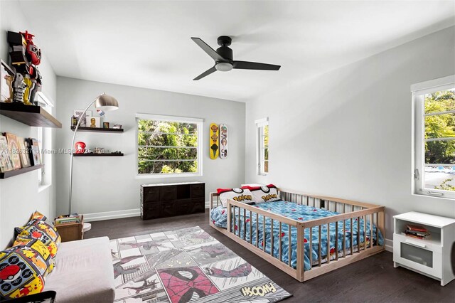 600 NE 55th Ter, Miami, FL 33137 - bedroom with wood finished floors and a ceiling fan