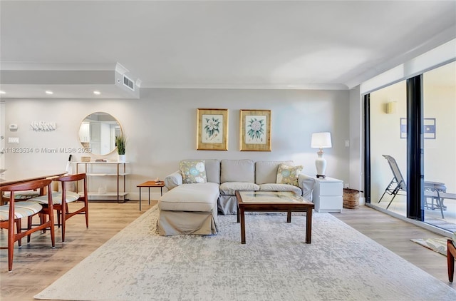 200 Ocean Trail Way Unit 701, Jupiter, FL 33477 - living area with light wood-style flooring, recessed lighting, and ornamental molding