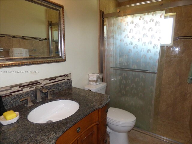 5501 Johnson St, Hollywood, FL 33021 - full bath featuring tiled shower, vanity, decorative backsplash, and tile patterned floors