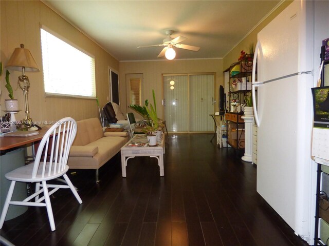 5501 Johnson St, Hollywood, FL 33021 - living area with wood finished floors, a ceiling fan, and ornamental molding