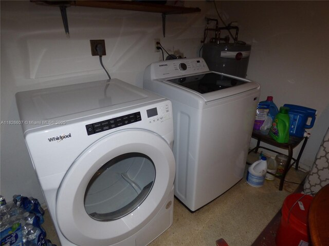 5501 Johnson St, Hollywood, FL 33021 - laundry area featuring washer and dryer and water heater