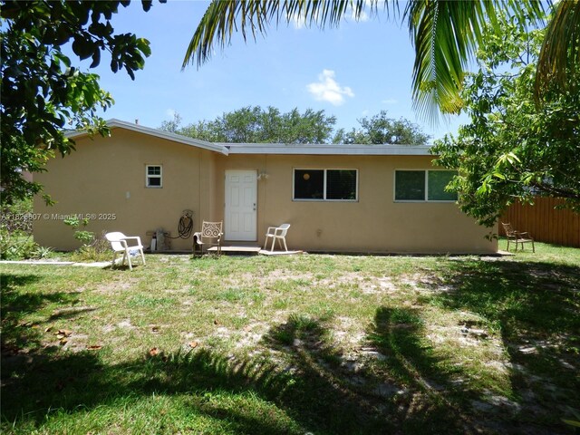 5501 Johnson St, Hollywood, FL 33021 - rear view of house with stucco siding