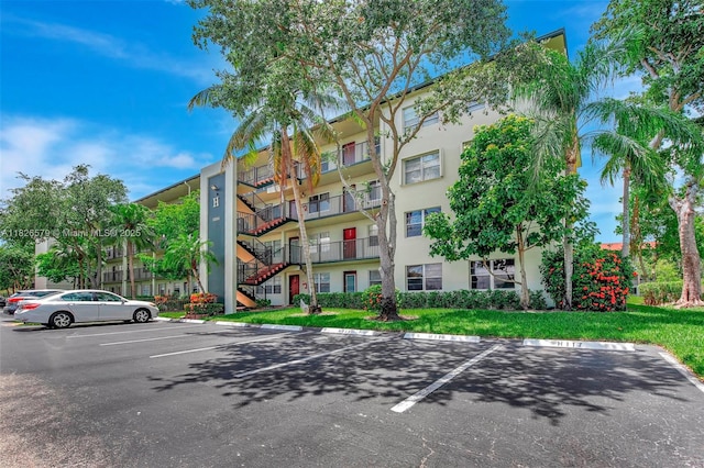 13355 SW 9th Ct Unit 413H, Pembroke Pines, FL 33027 - view of apartment building / complex with uncovered parking