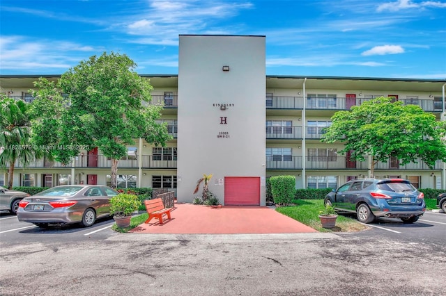 13355 SW 9th Ct Unit 413H, Pembroke Pines, FL 33027 - view of apartment building / complex with uncovered parking