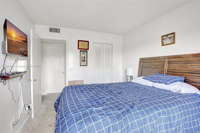 13355 SW 9th Ct Unit 413H, Pembroke Pines, FL 33027 - bedroom featuring carpet floors, a closet, and a textured ceiling