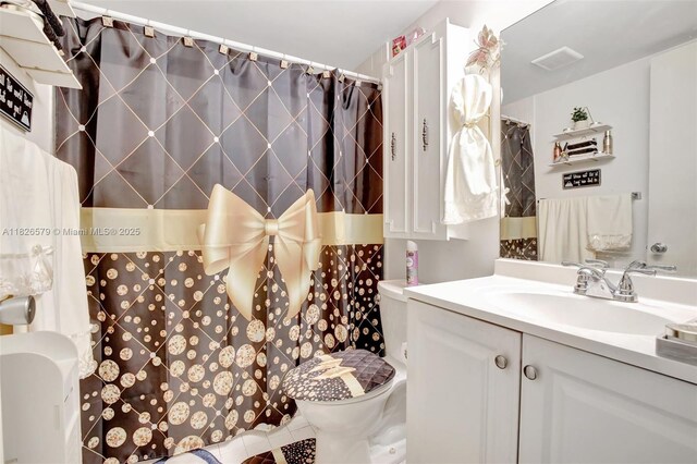 13355 SW 9th Ct Unit 413H, Pembroke Pines, FL 33027 - full bathroom with vanity, tile patterned flooring, and a shower with curtain