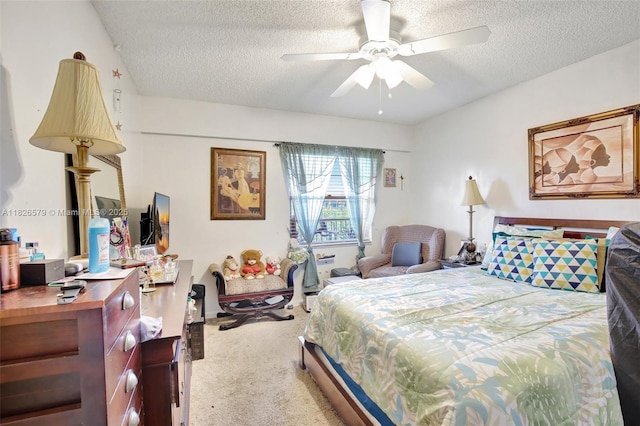 13355 SW 9th Ct Unit 413H, Pembroke Pines, FL 33027 - carpeted bedroom featuring a textured ceiling and ceiling fan