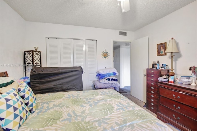 13355 SW 9th Ct Unit 413H, Pembroke Pines, FL 33027 - bedroom with a closet, a textured ceiling, and carpet floors