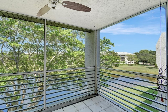 9311 Orange Grove Dr Unit 409, Davie, FL 33324 - balcony with a ceiling fan, a water view, and view of scattered trees