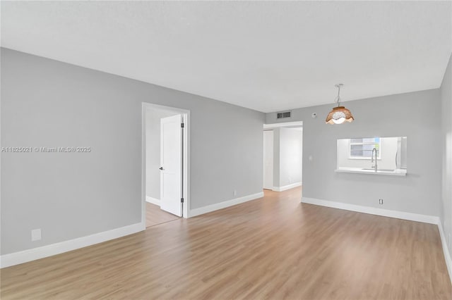 9311 Orange Grove Dr Unit 409, Davie, FL 33324 - unfurnished room featuring light wood-type flooring