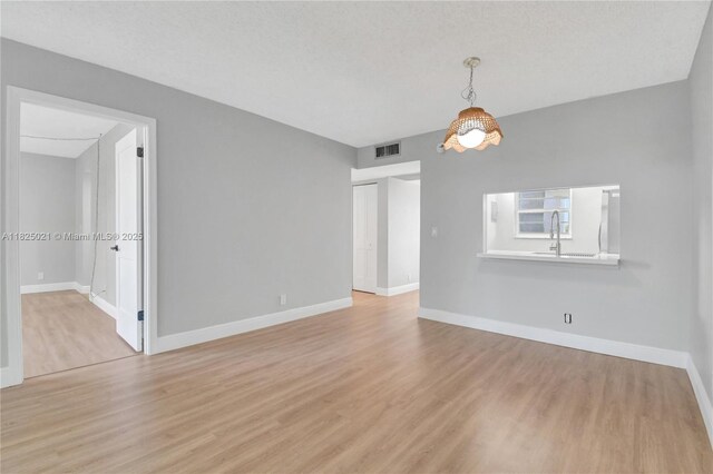 9311 Orange Grove Dr Unit 409, Davie, FL 33324 - unfurnished room with light wood-style flooring and baseboards