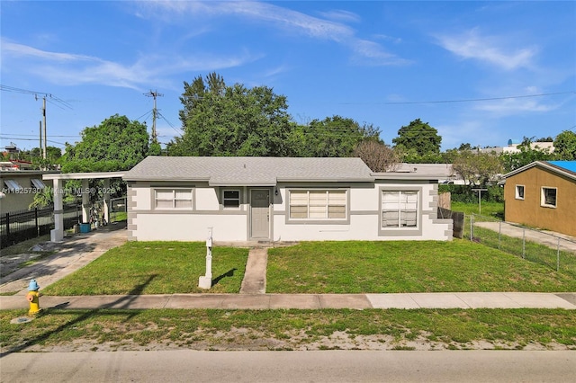 17415 NW 27th Ct, Miami Gardens, FL 33056 - view of front of home with stucco siding and roof with shingles