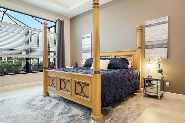 9190 SW Esule Way, Port St Lucie, FL 34987 - bedroom featuring baseboards and tile patterned flooring