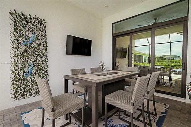 9190 SW Esule Way, Port St Lucie, FL 34987 - view of patio featuring outdoor dining area