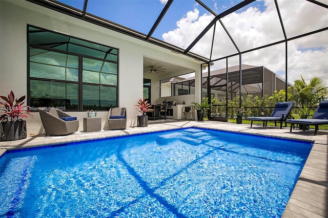 9190 SW Esule Way, Port St Lucie, FL 34987 - outdoor pool featuring a patio area, outdoor lounge area, ceiling fan, and a lanai