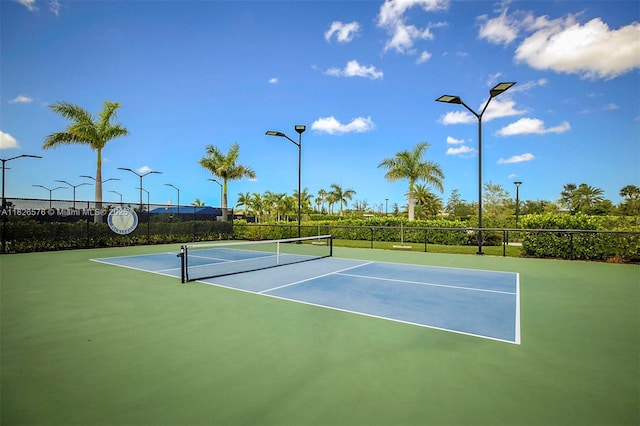 9190 SW Esule Way, Port St Lucie, FL 34987 - view of tennis court with community basketball court