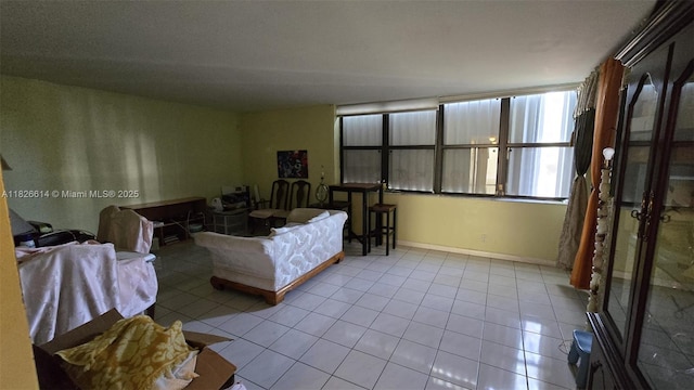 20441 NE 30th Ave Unit 114-9, Aventura, FL 33180 - living room featuring tile patterned floors
