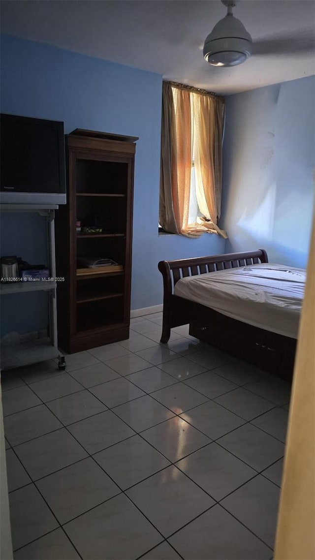 20441 NE 30th Ave Unit 114-9, Aventura, FL 33180 - bedroom featuring light tile patterned flooring and baseboards