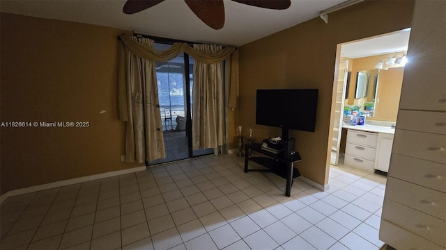 20441 NE 30th Ave Unit 114-9, Aventura, FL 33180 - living room with a ceiling fan and light tile patterned floors