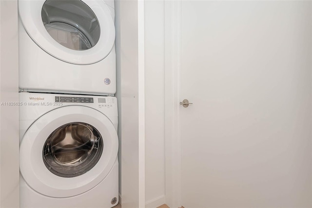 824 SE 12th Ct Unit 1, Fort Lauderdale, FL 33316 - washroom with stacked washer and clothes dryer