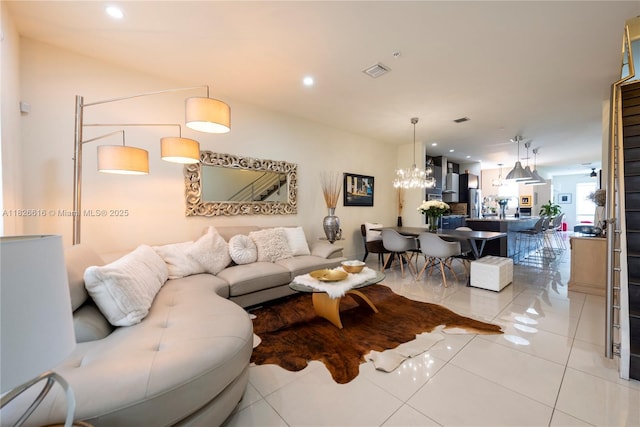 10260 NW 63rd Ter Unit 208, Doral, FL 33178 - living room with a chandelier, light tile patterned floors, and recessed lighting