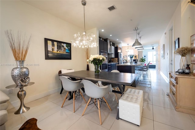 10260 NW 63rd Ter Unit 208, Doral, FL 33178 - dining room with a chandelier and light tile patterned flooring