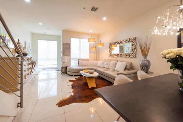 10260 NW 63rd Ter Unit 208, Doral, FL 33178 - living area with light tile patterned floors, a chandelier, recessed lighting, and stairs