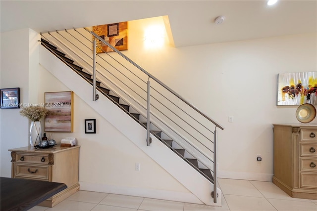 10260 NW 63rd Ter Unit 208, Doral, FL 33178 - staircase with baseboards and tile patterned floors