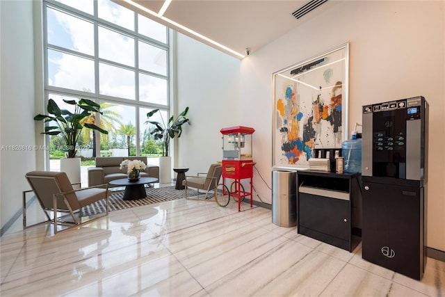 10260 NW 63rd Ter Unit 208, Doral, FL 33178 - sitting room with light tile patterned floors