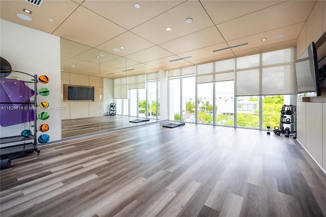 10260 NW 63rd Ter Unit 208, Doral, FL 33178 - exercise room featuring wood finished floors, expansive windows, and recessed lighting