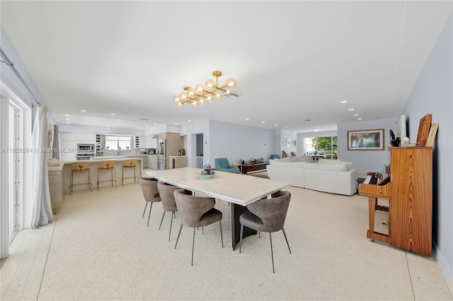 2010 NE 122nd Rd, North Miami, FL 33181 - dining area featuring recessed lighting and a chandelier