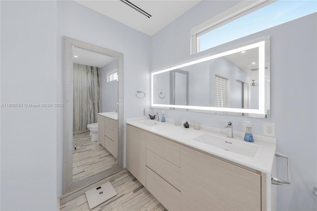 2010 NE 122nd Rd, North Miami, FL 33181 - bathroom featuring double vanity and a shower