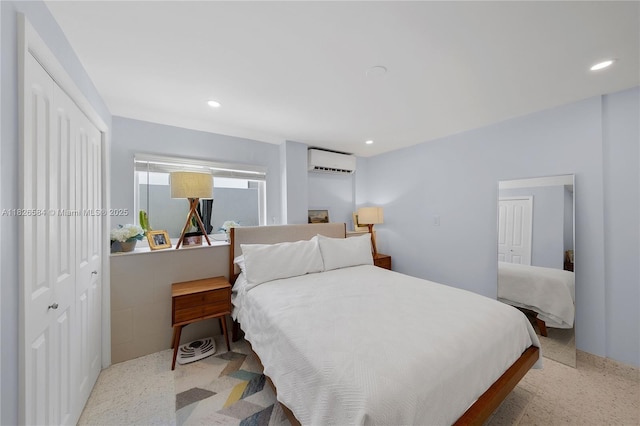 2010 NE 122nd Rd, North Miami, FL 33181 - bedroom with a wall mounted air conditioner, a closet, and recessed lighting