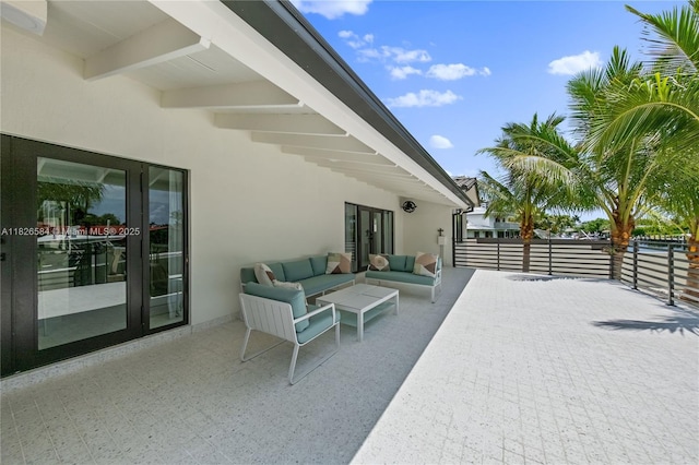 2010 NE 122nd Rd, North Miami, FL 33181 - view of patio / terrace featuring french doors and an outdoor living space