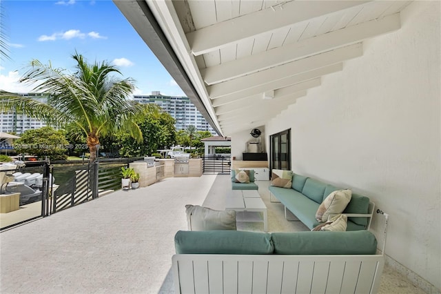 2010 NE 122nd Rd, North Miami, FL 33181 - view of patio / terrace with an outdoor hangout area and exterior kitchen