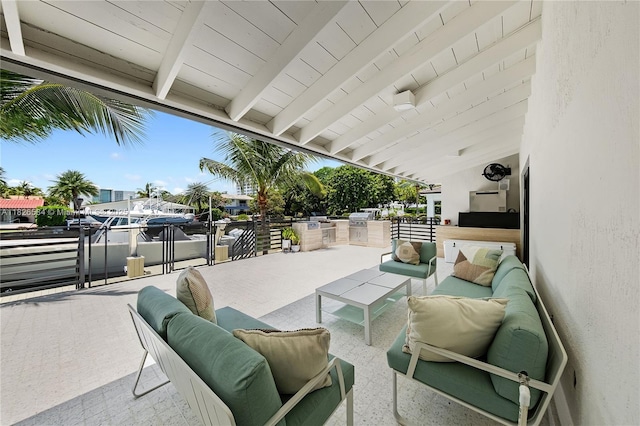 2010 NE 122nd Rd, North Miami, FL 33181 - view of patio / terrace featuring an outdoor living space and an outdoor kitchen
