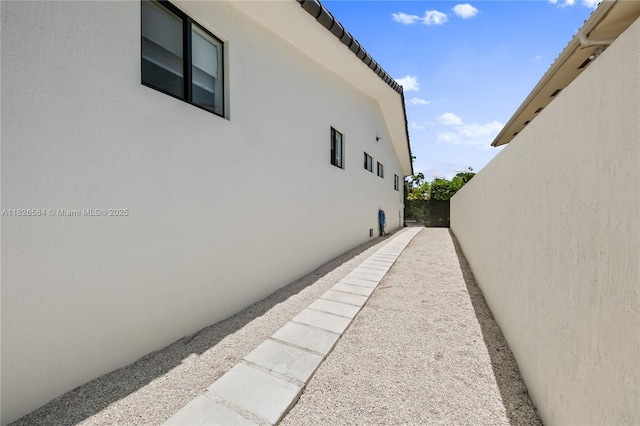 2010 NE 122nd Rd, North Miami, FL 33181 - view of side of home with stucco siding