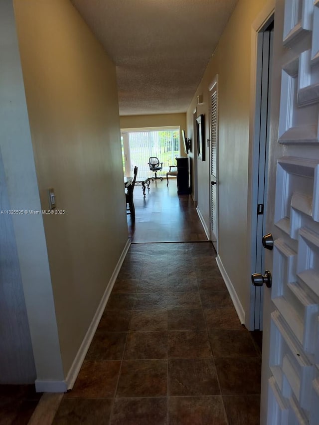 13791 Flora Pl Unit B, Delray Beach, FL 33484 - hallway with baseboards