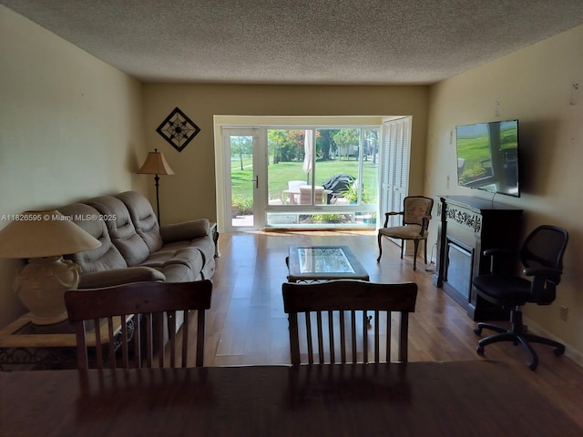 13791 Flora Pl Unit B, Delray Beach, FL 33484 - living area with wood finished floors and a textured ceiling