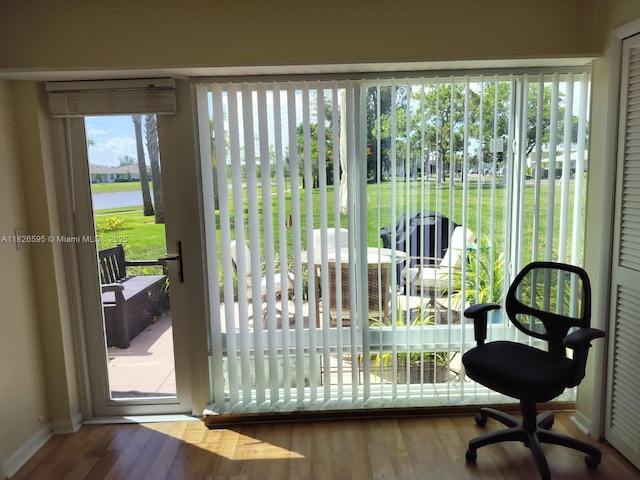 13791 Flora Pl Unit B, Delray Beach, FL 33484 - entryway featuring a water view and wood finished floors