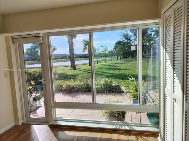 13791 Flora Pl Unit B, Delray Beach, FL 33484 - entryway with a water view and wood finished floors
