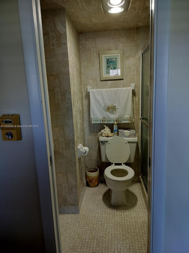 13791 Flora Pl Unit B, Delray Beach, FL 33484 - full bathroom with tile patterned floors and a shower stall