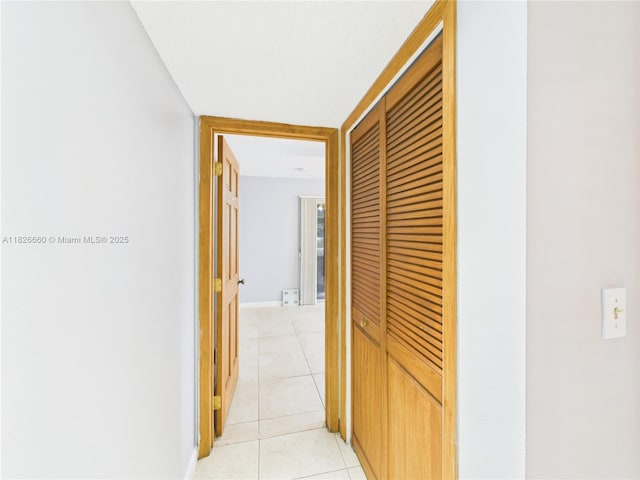 4113 NW 88th Ave Unit 105, Coral Springs, FL 33065 - hallway with light tile patterned floors